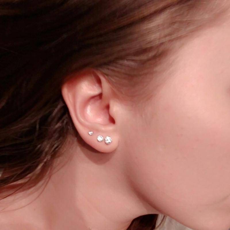 https://nuroco.com/cdn/shop/products/earrings-6-sizes-3mm-9mm-screw-back-studs-simple-clear-cz-four-prong-earrings-stainless-steel-set-7089314463825.jpg?v=1578305295
